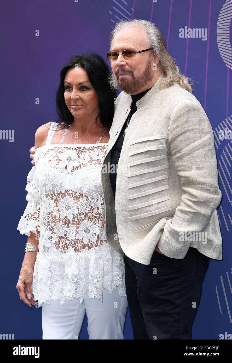 Barry Gibb and wife Linda Gibb arriving for the Nordoff Robbins O2 Silver Clef Awards held at the Grosvenor House Hotel in London, Friday June 30, 2017 Stock Photo