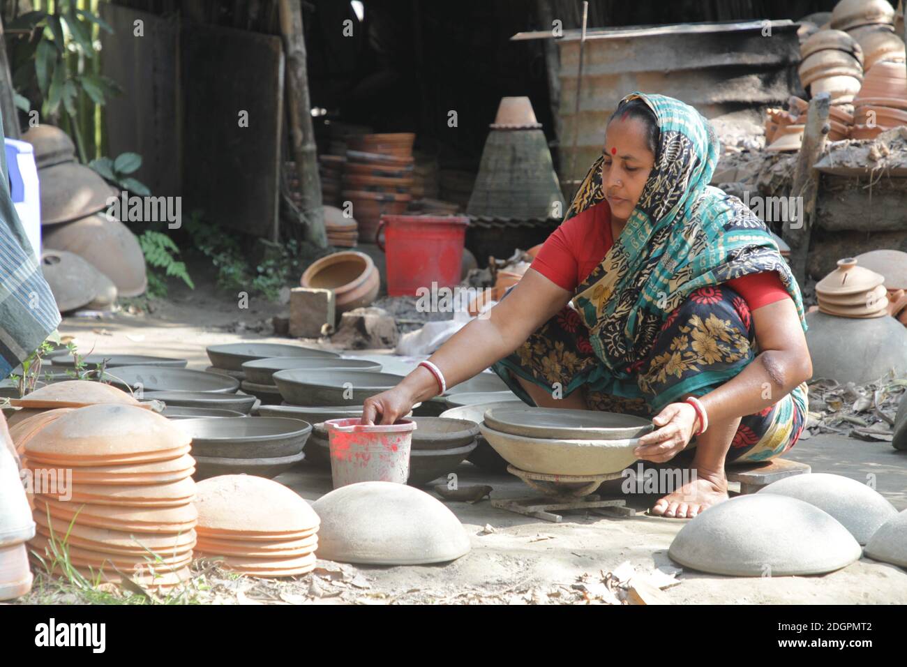 The traditional earthenware of Bengal is getting lost in the crowd of plastic products. Many people who are engaged in this profession have quit their Stock Photo