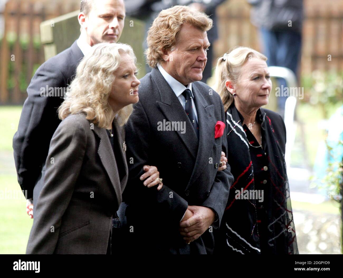 Hayley Mills (left) Jonathan Mills (centre) and Juliet Mills (right) attending the funeral of their actor father Sir John Mills in St Mary's Church, Denham, Buckinghamshire. Doug Peters/allactiondigital.com  Stock Photo