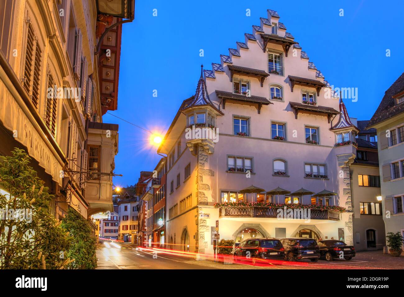 Night scene in KolinPlatz, old town of Zug, Switzerland, featuring the