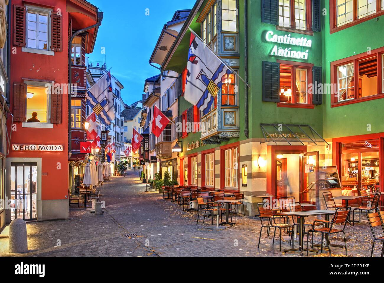 Zurich, Switzerland - June 26, 2020 - Evening scene in Zurich, Switzerland along the pitoresque Augustinergasse, shortly after the Covid-19 opening of Stock Photo