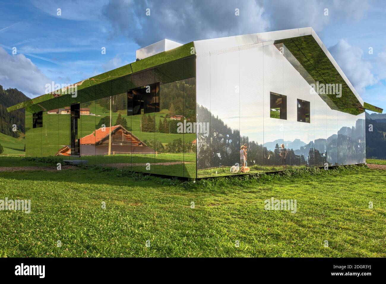 Gstaad, Switzerland - August 15, 2020 - Temporary art instalation by Doug Aitken, Mirage consist of a house of mirrors on a hiking trail between Schön Stock Photo