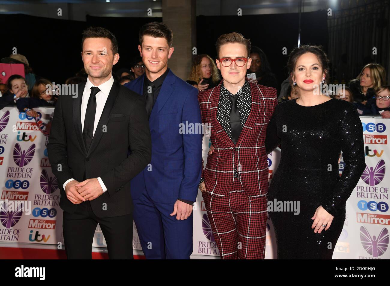 Harry Judd (left), guest and Tom Fletcher (right) of McFly, with Tom's wife Giovanna Fletcher attending the Pride of Britain Awards 2017 held at Grosvenor House, London. Photo credit should read: Doug Peters/EMPICS Entertainment  Stock Photo