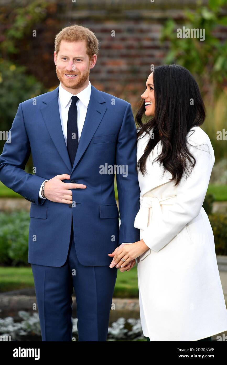 Prince Harry and Meghan Markle at a photocall to announce their engagement  at Kensington Palace, London. Photo credit should read: Doug Peters/EMPICS  Entertainment Stock Photo - Alamy