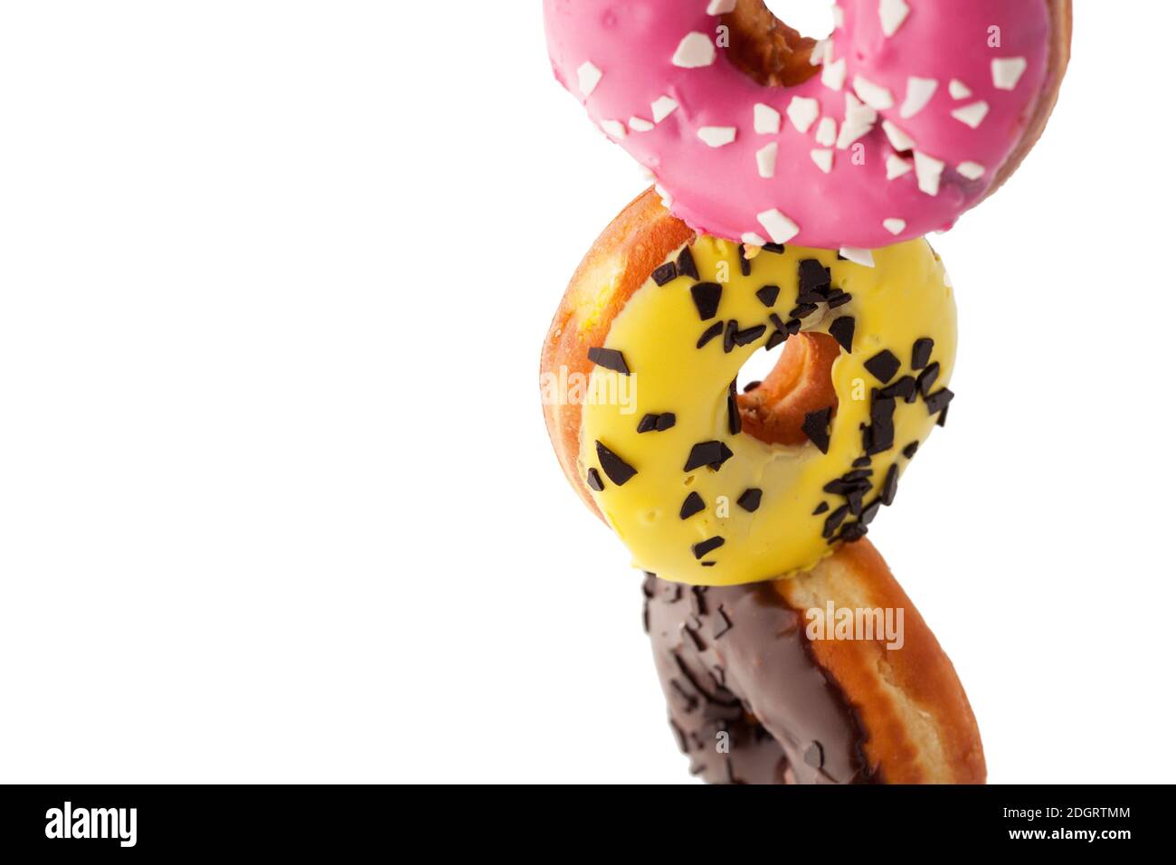 Stack of colorful donuts isolated on white background Stock Photo - Alamy