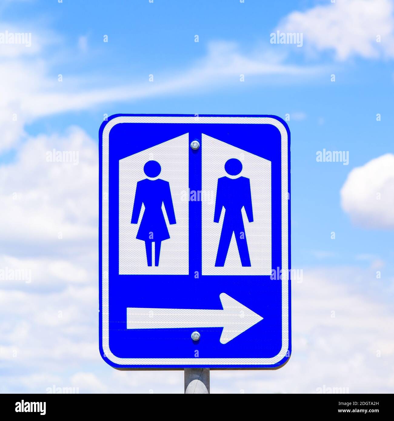 bathroom sign with arrow