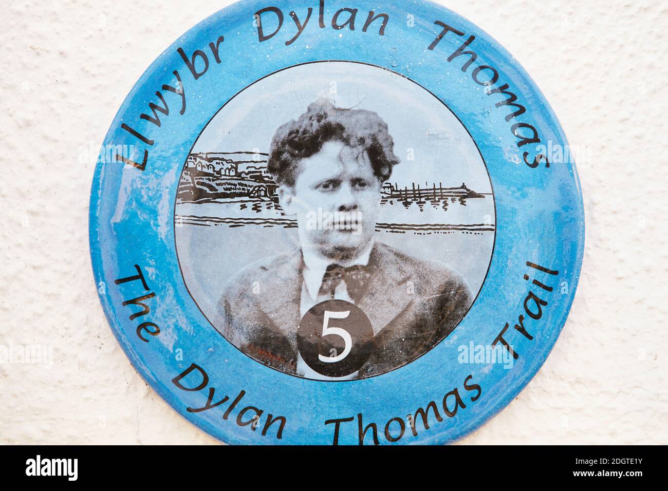 Blue wall plaque marking the Dylan Thomas Trail in New Quay, Ceredigion, Wales, UK Stock Photo