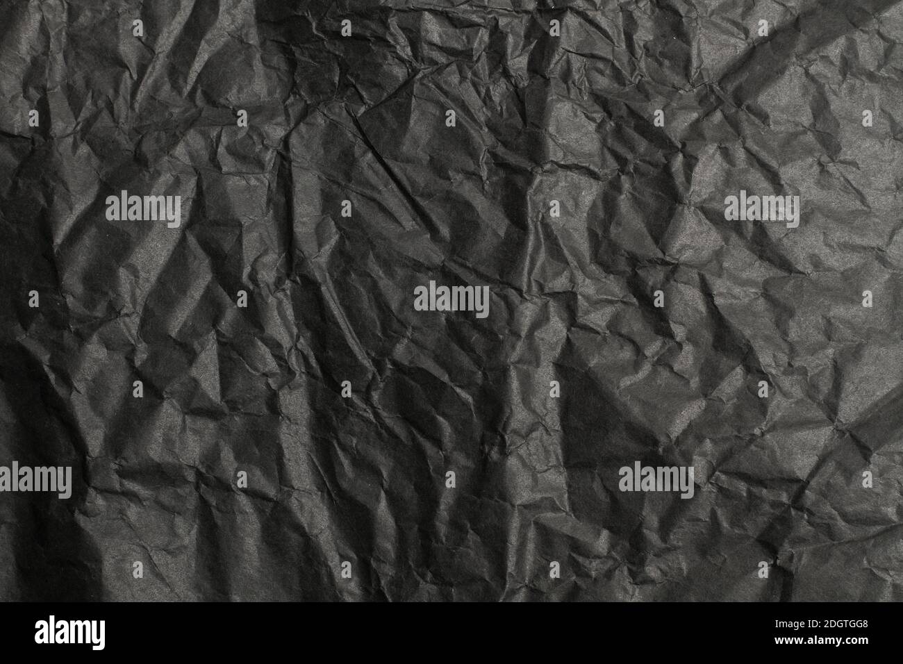 Black wrinkled paper hi-res stock photography and images - Alamy