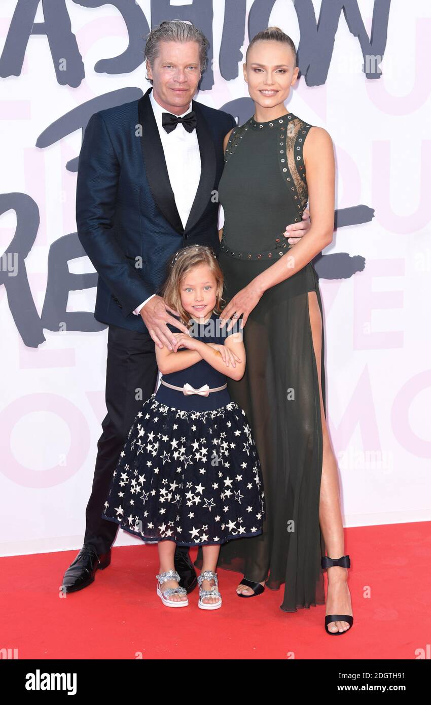 Peter Bakker, Natasha Poly and daughter Aleksandra Christina Bakker arriving at the Fashion For