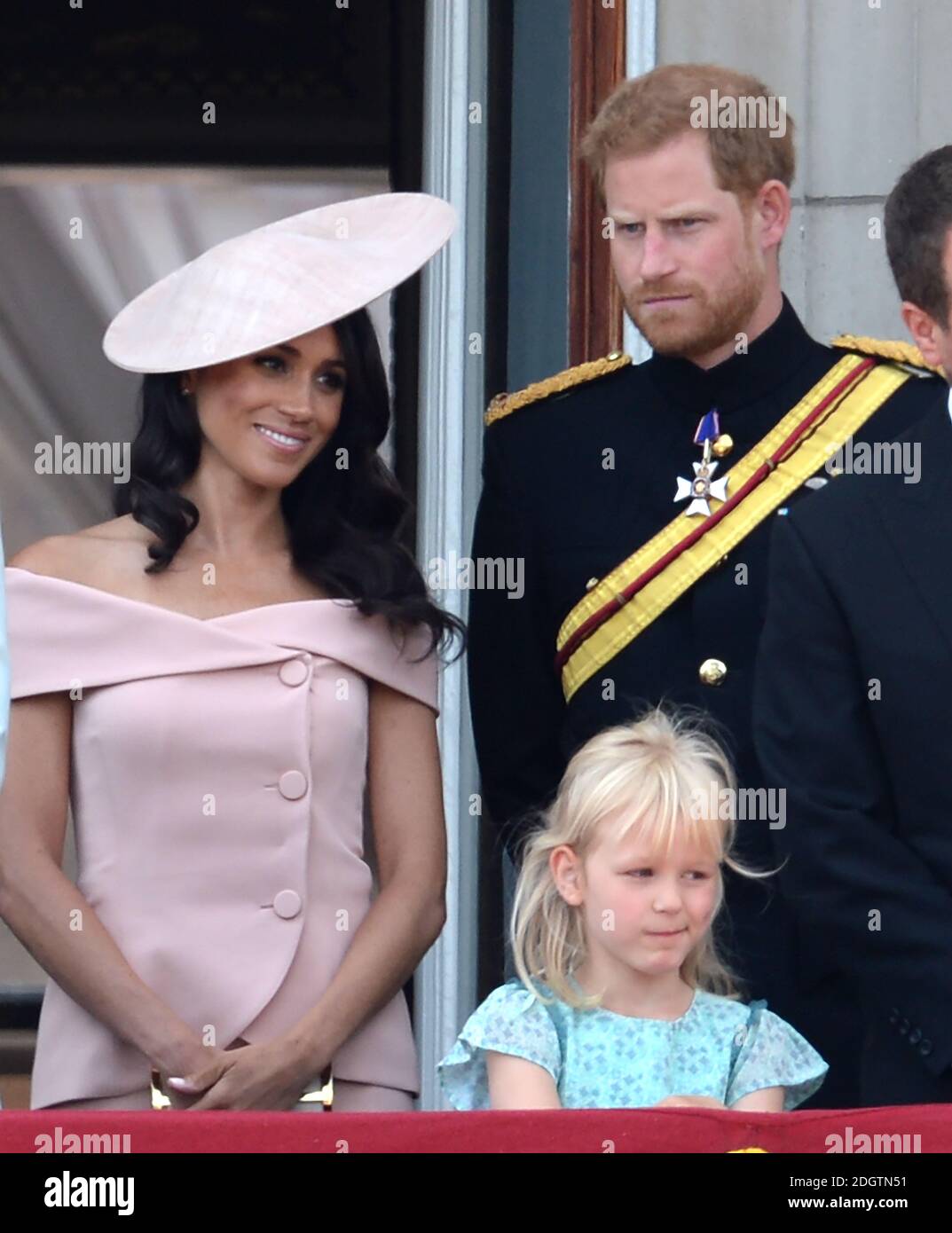 Prince Harry and Meghan Duchess of Sussex on the balcony of Buckingham Palace at Trooping The Colour, London. Photo credit should read: Doug Peters/EMPICS Stock Photo