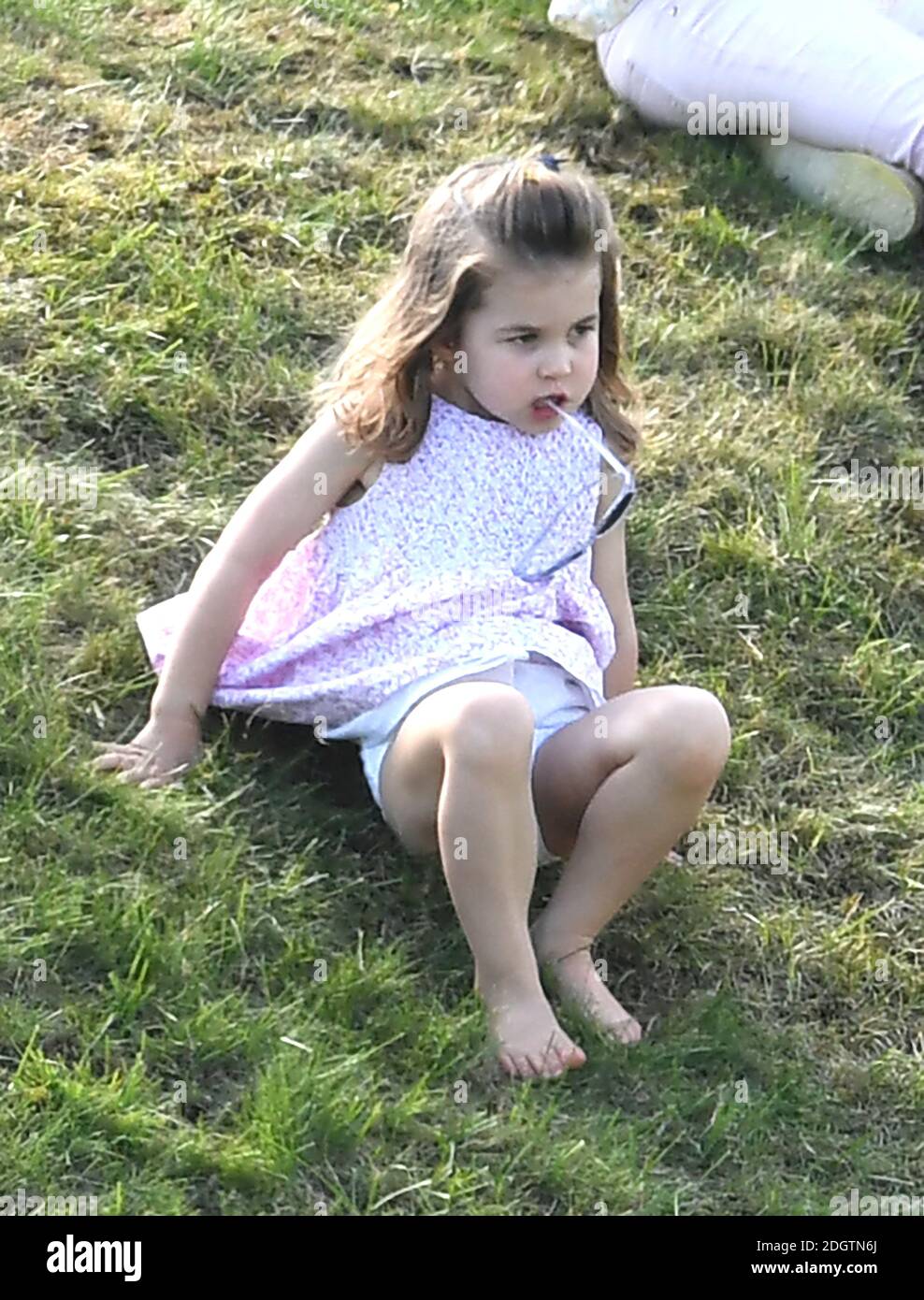 Princess Charlotte watches on as Prince William Duke of Cambridge plays