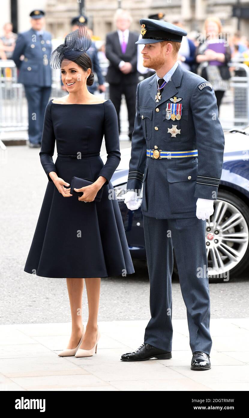 Meghan, Duchess of Sussex (left) and Prince Harry during the RAF Centenary at Westminster Abbey, London. Photo credit should read: Doug Peters/EMPICS Stock Photo