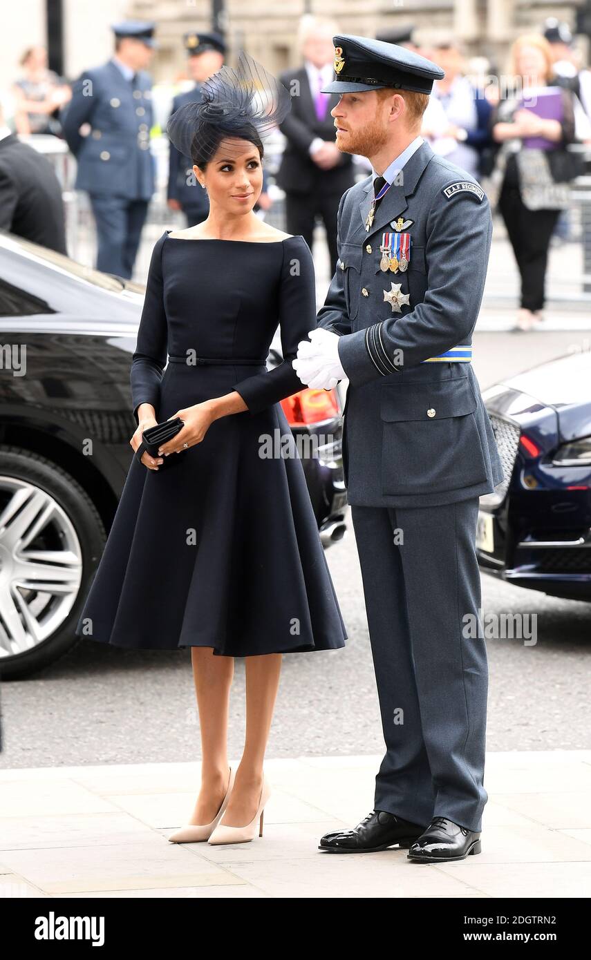 Meghan, Duchess of Sussex (left) and Prince Harry during the RAF Centenary at Westminster Abbey, London. Photo credit should read: Doug Peters/EMPICS Stock Photo