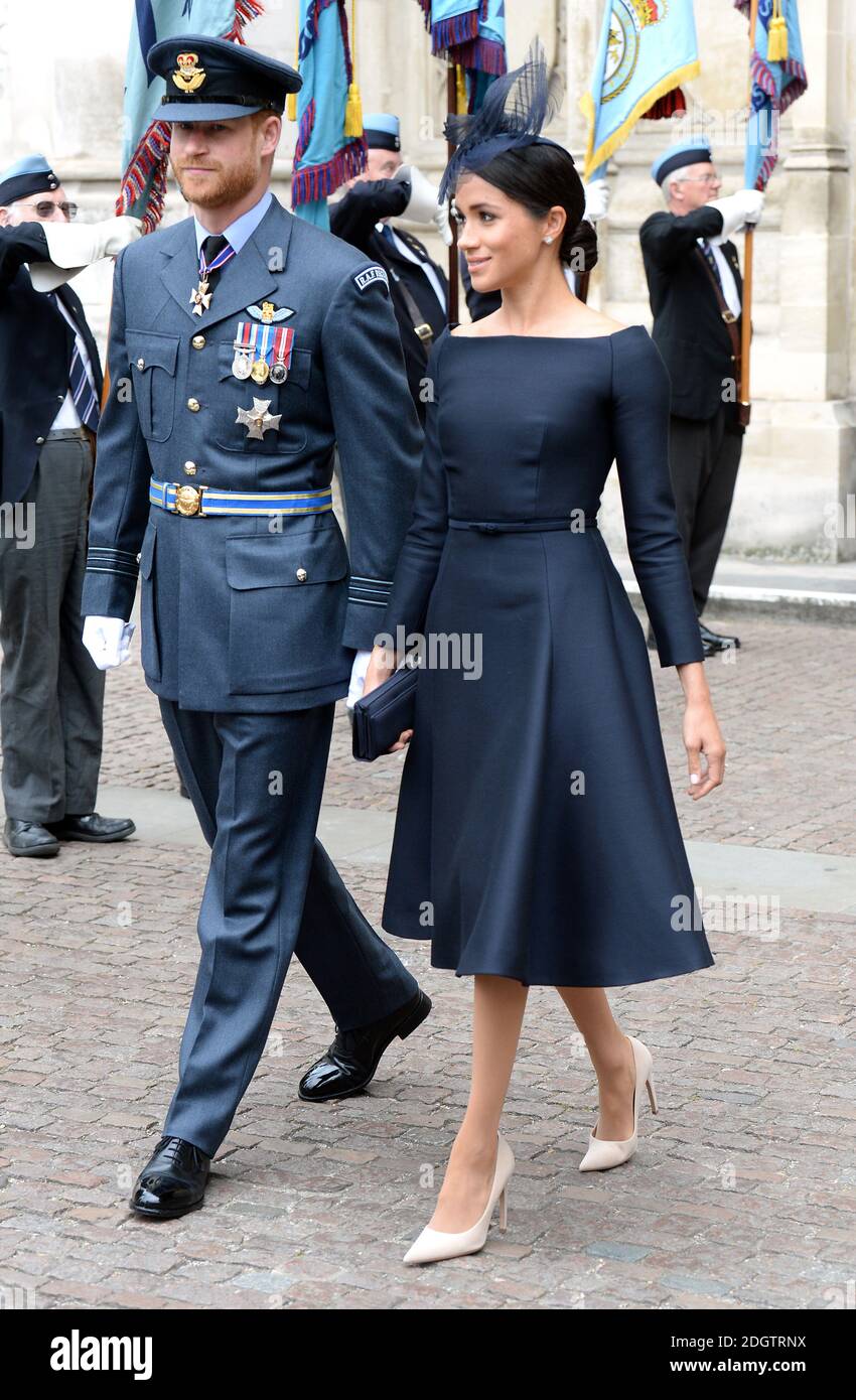 Meghan, Duchess of Sussex (right) and Prince Harry during the RAF Centenary at Westminster Abbey, London. Photo credit should read: Doug Peters/EMPICS Stock Photo