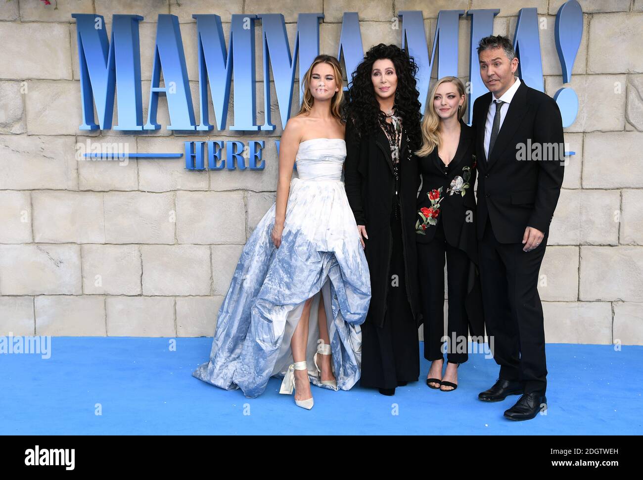 Lily James (left), Cher (second left) and Amanda Seyfried and Director Ol Parker (right) attending the premiere of Mamma Mia! Here We Go Again held at the Eventim Hammersmith Apollo, London. Photo credit should read: Doug Peters/EMPICS Stock Photo