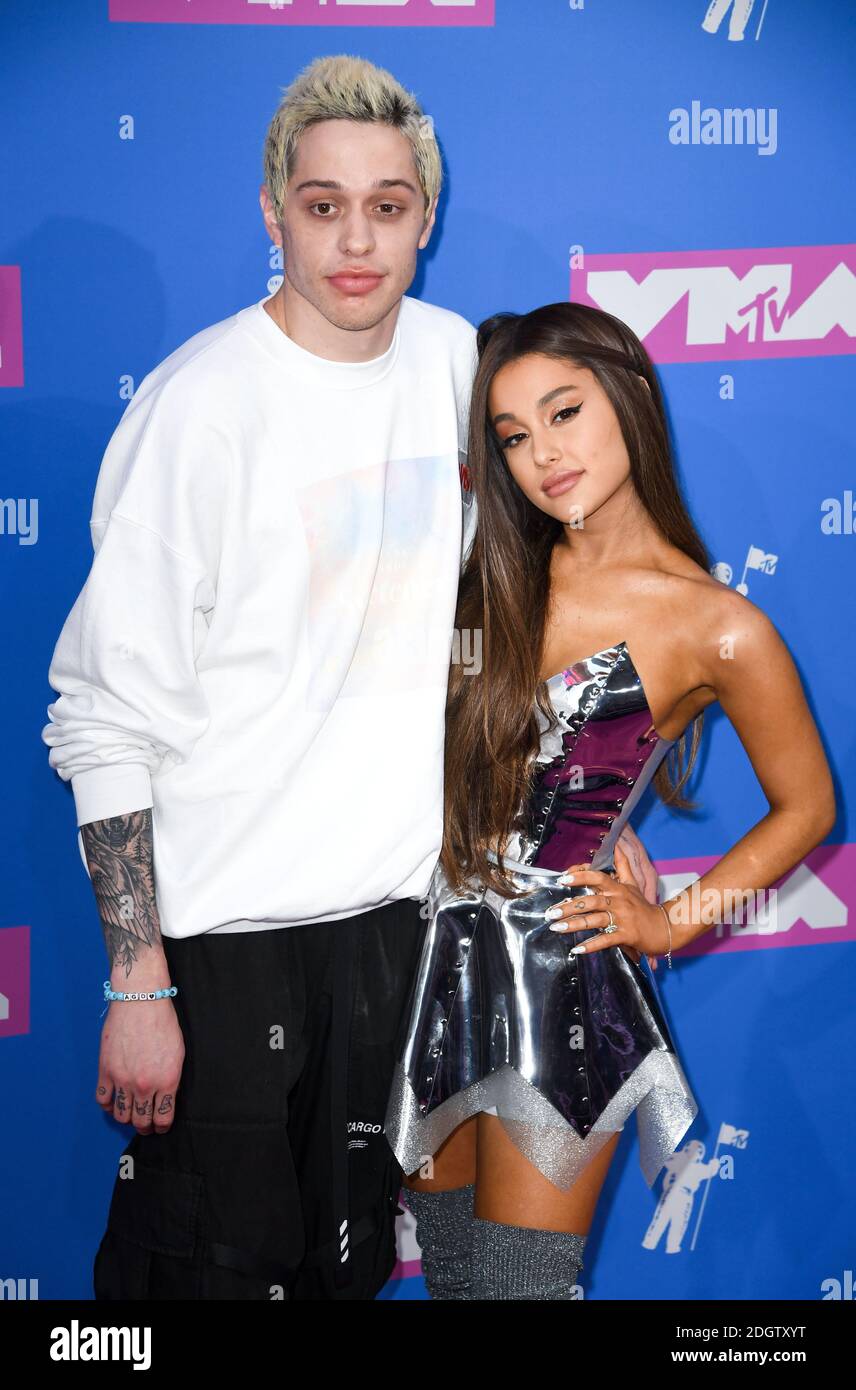 Pete Davidson and Ariana Grande arriving at the MTV Video Music Awards 2018, Radio City, New York. Photo credit should read: Doug Peters/EMPICS  Stock Photo