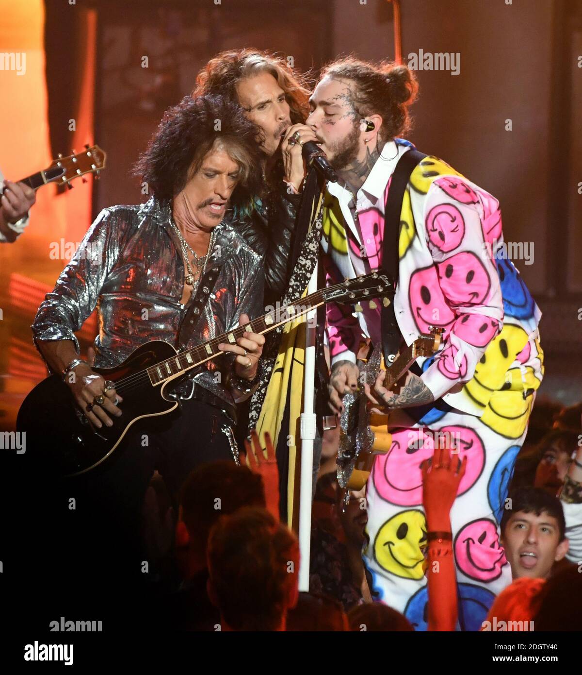 Post Malone (right) performs with Joe Perry (left) and Steven Tyler of  Aerosmith on stage at the MTV Video Music Awards 2018, Radio City, New  York. Photo credit should read: Doug Peters/EMPICS