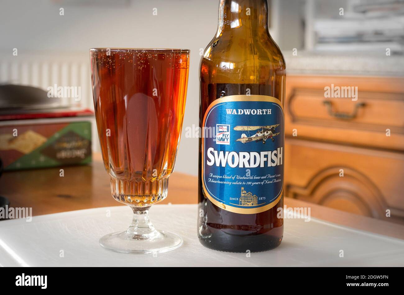 A poured glass of Wadworth Swordfish bitter ale ready to drink in an English home Stock Photo