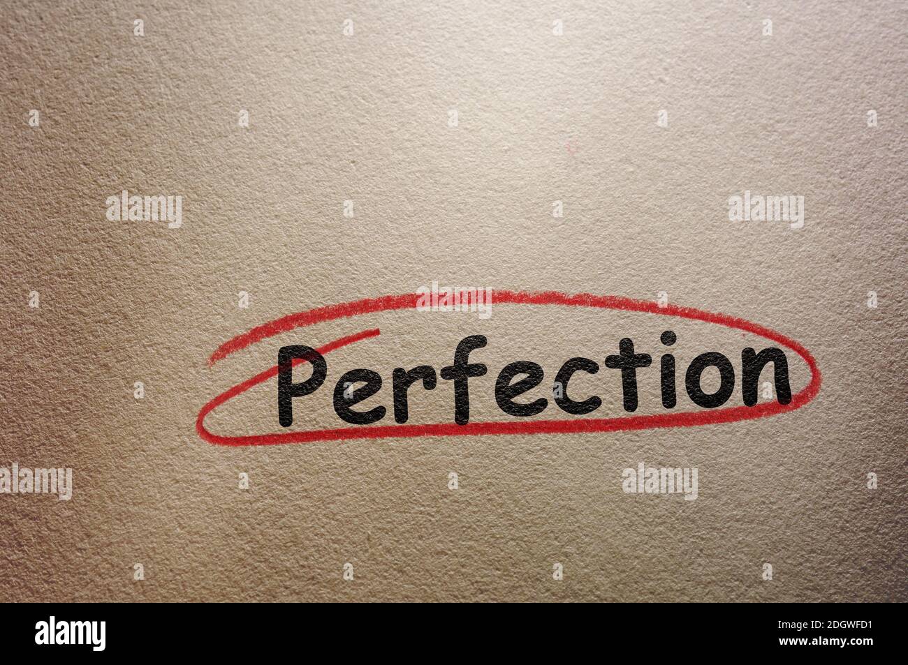 Perfection text circled in red pencil Stock Photo