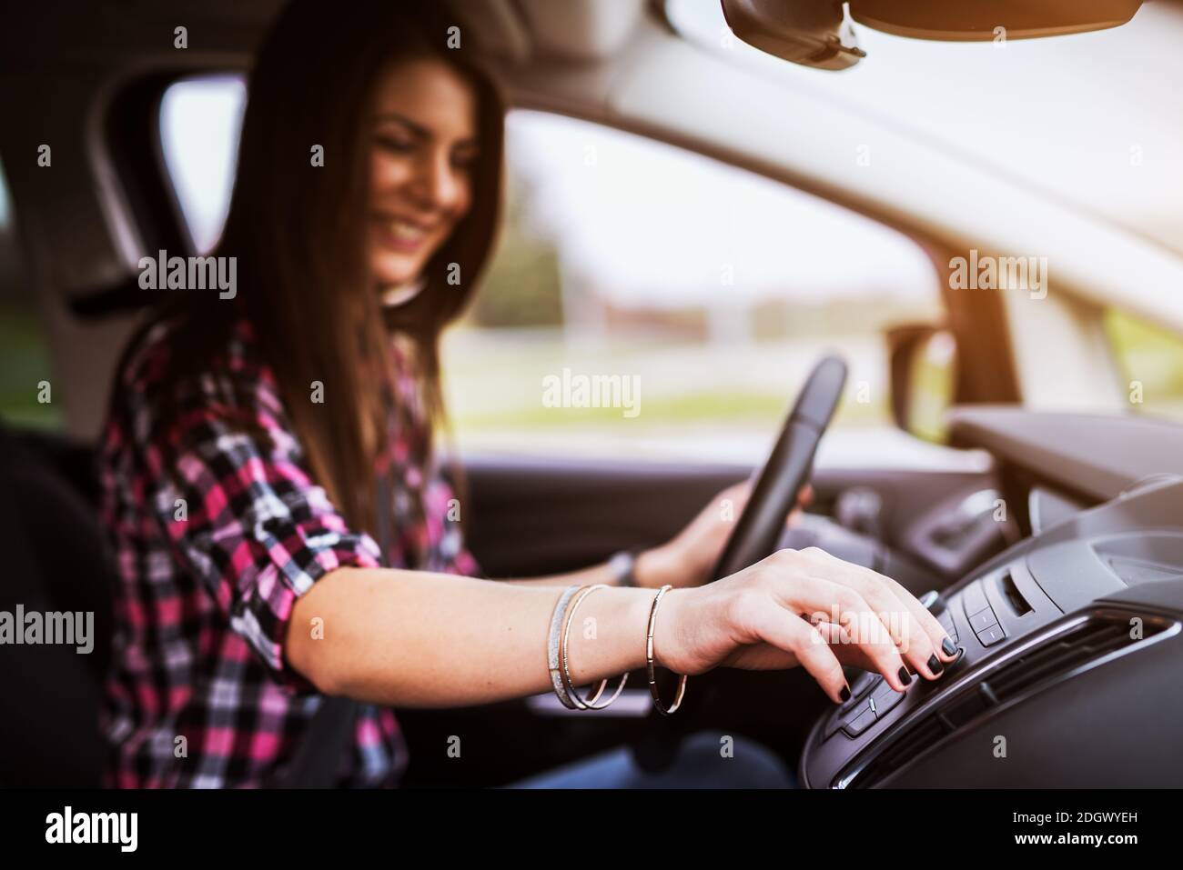 Woman adjusting car seat hi-res stock photography and images - Alamy