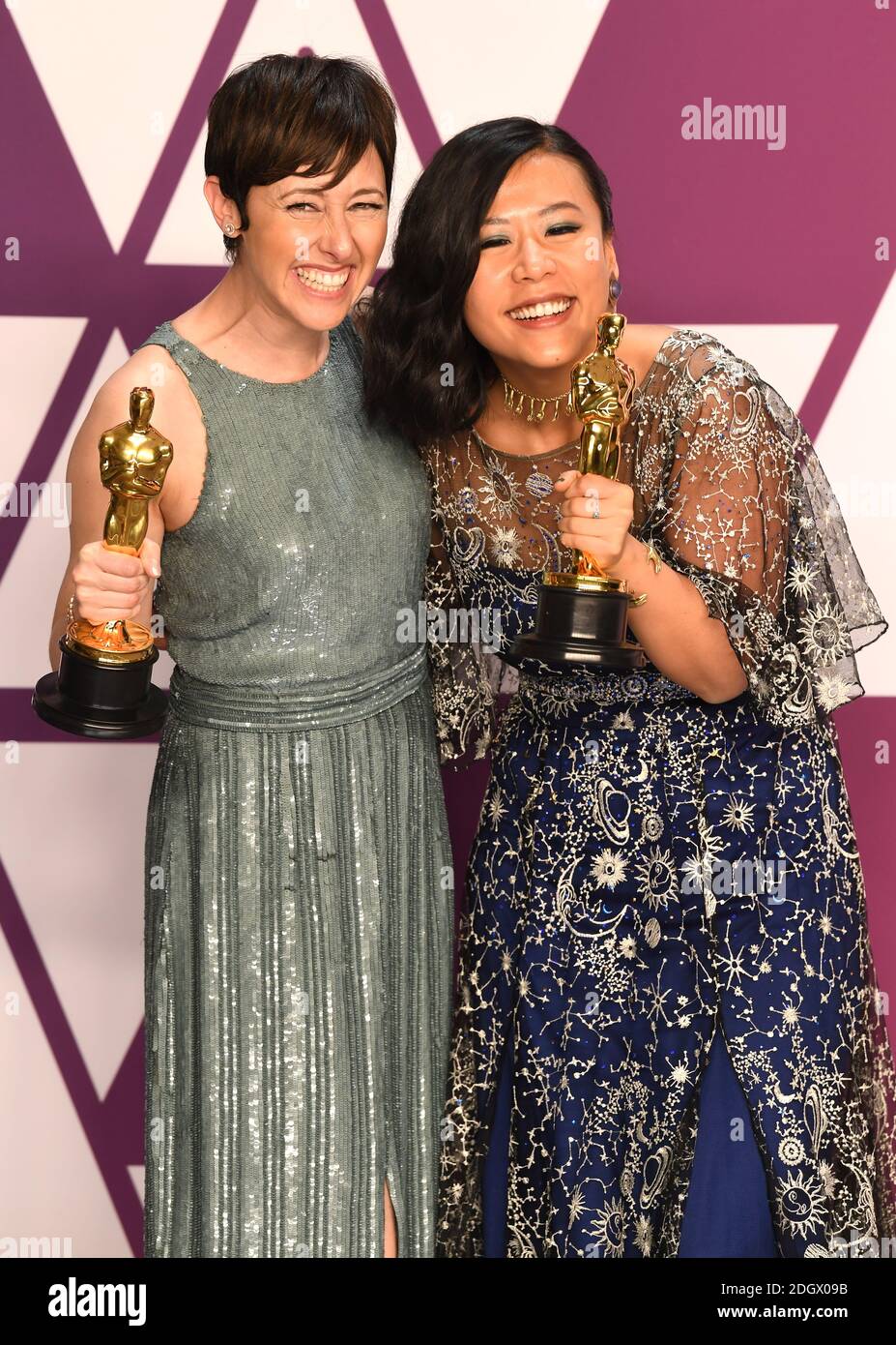 Becky Neiman-Cobb (left) and Domee She with the award for best short film (animated) for Bao in the press room at the 91st Academy Awards held at the Dolby Theatre in Hollywood, Los Angeles, USA Stock Photo