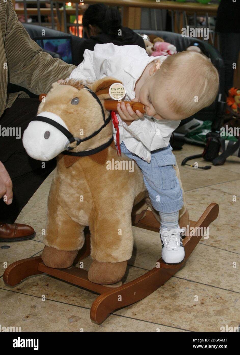 Penny Lancaster and son Alastair launch Capital Radio's Help A London Child Christmas Appeal, live on air outside the Early Learning Centre, Bluewater Shopping Centre, Kent. Stock Photo