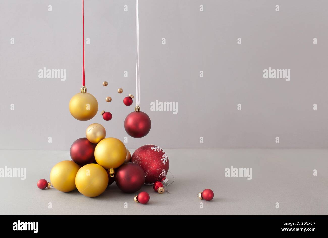 Abstract red and gold christmas baubles background Stock Photo - Alamy