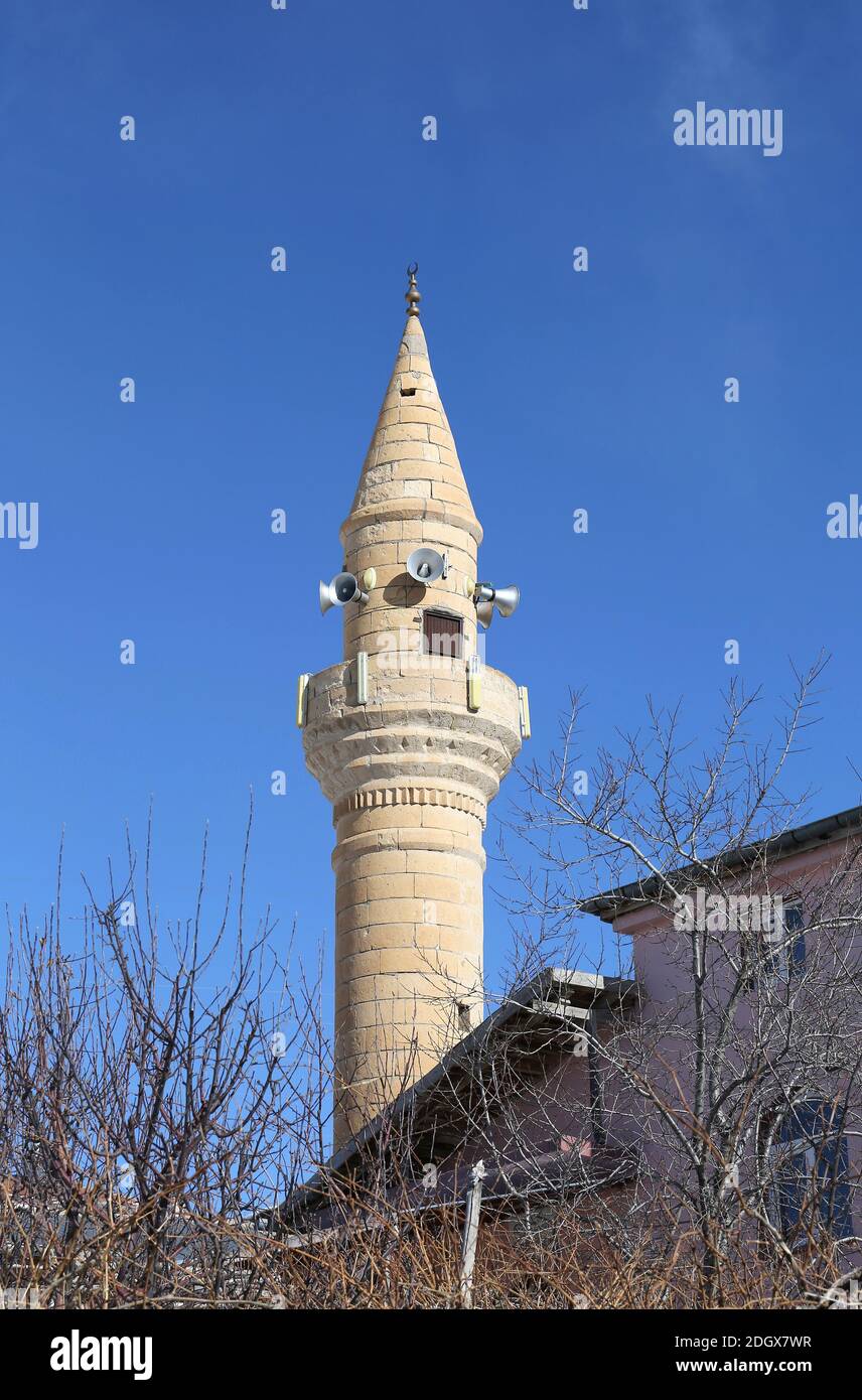Small Minaret with Blue Sky Background in Nigde,Turkey Stock Photo