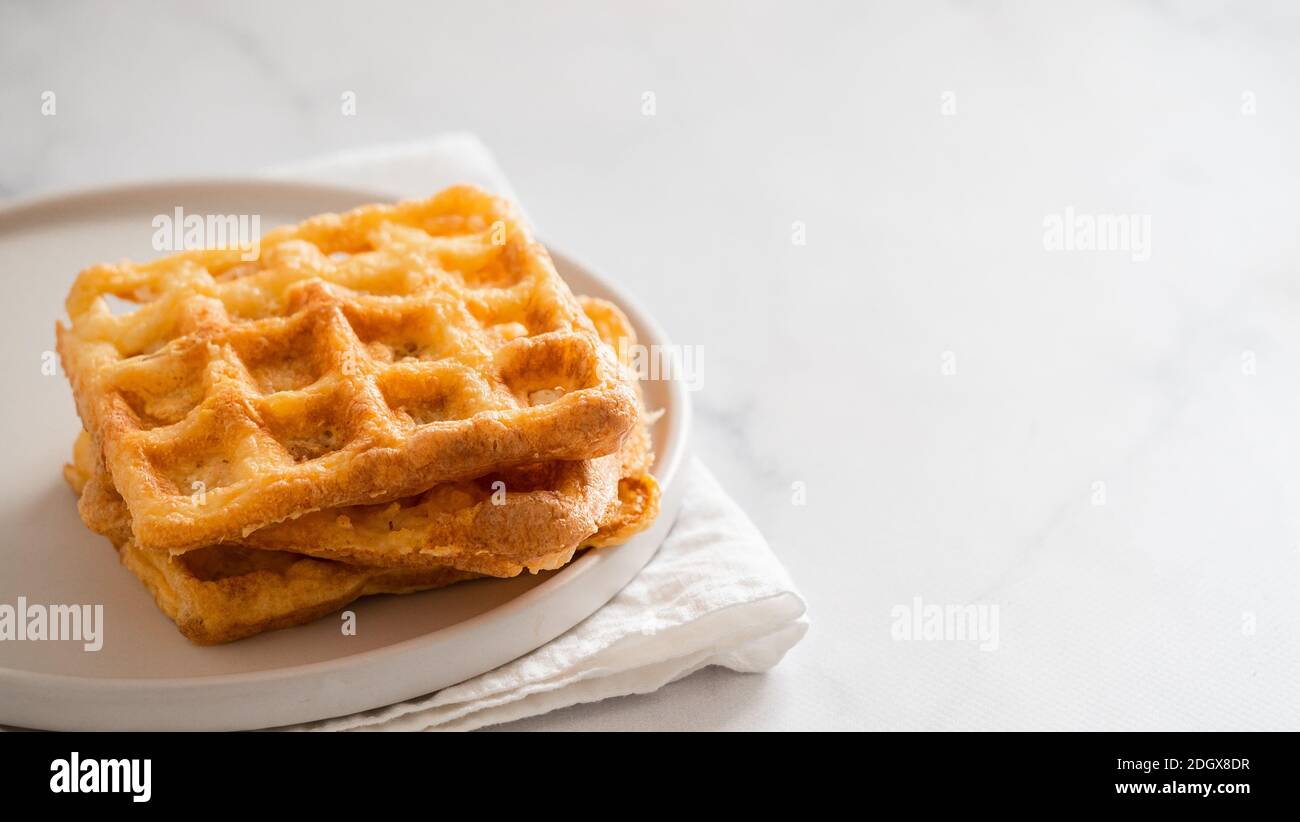 Savory keto two ingredients waffles chaffles Stock Photo Alamy
