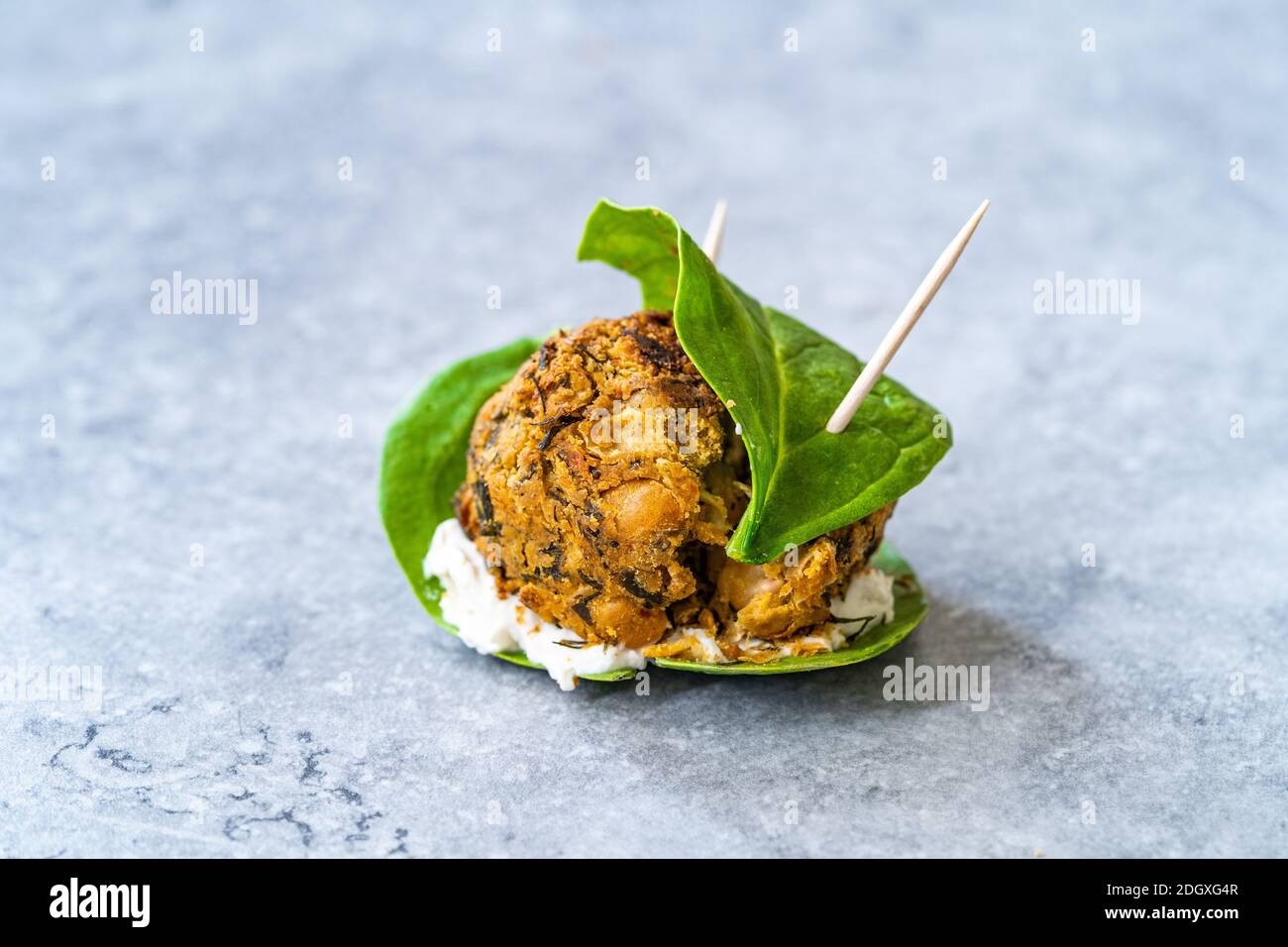 Falafel Balls with Baby Spinach and Truffle Cream Cheese. Ready to