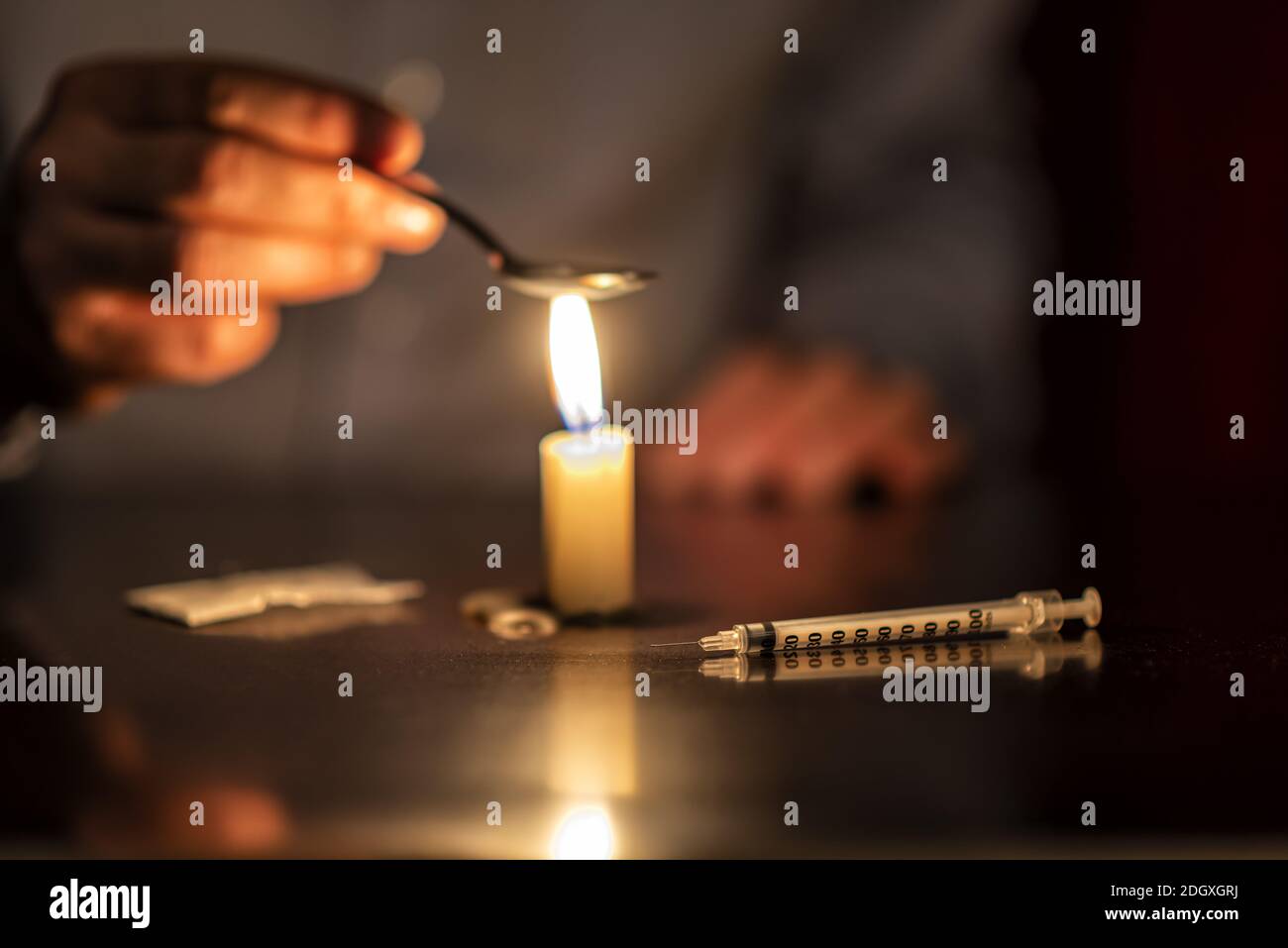 Injection, candle and Heroine Stock Photo
