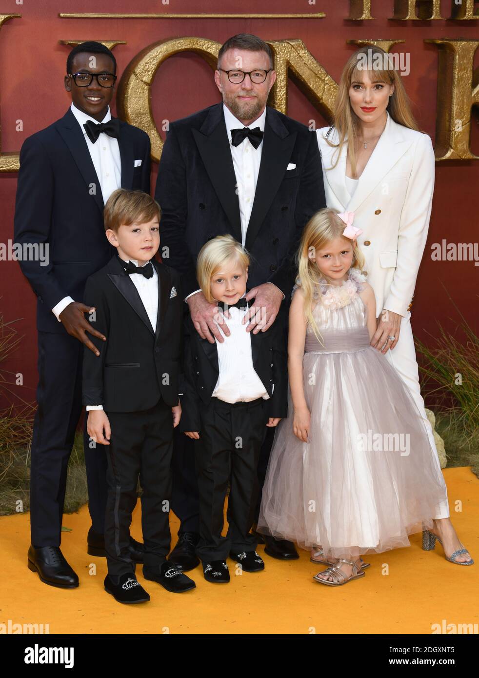 Guy Ritchie, with with Jacqui Ainsley, children David Bander, Rafael, Rivka  and Levi at the European Premiere of The Lion King, Odeon Cinema, Leicester  Square, London. Photo credit should read: Doug Peters/EMPICS