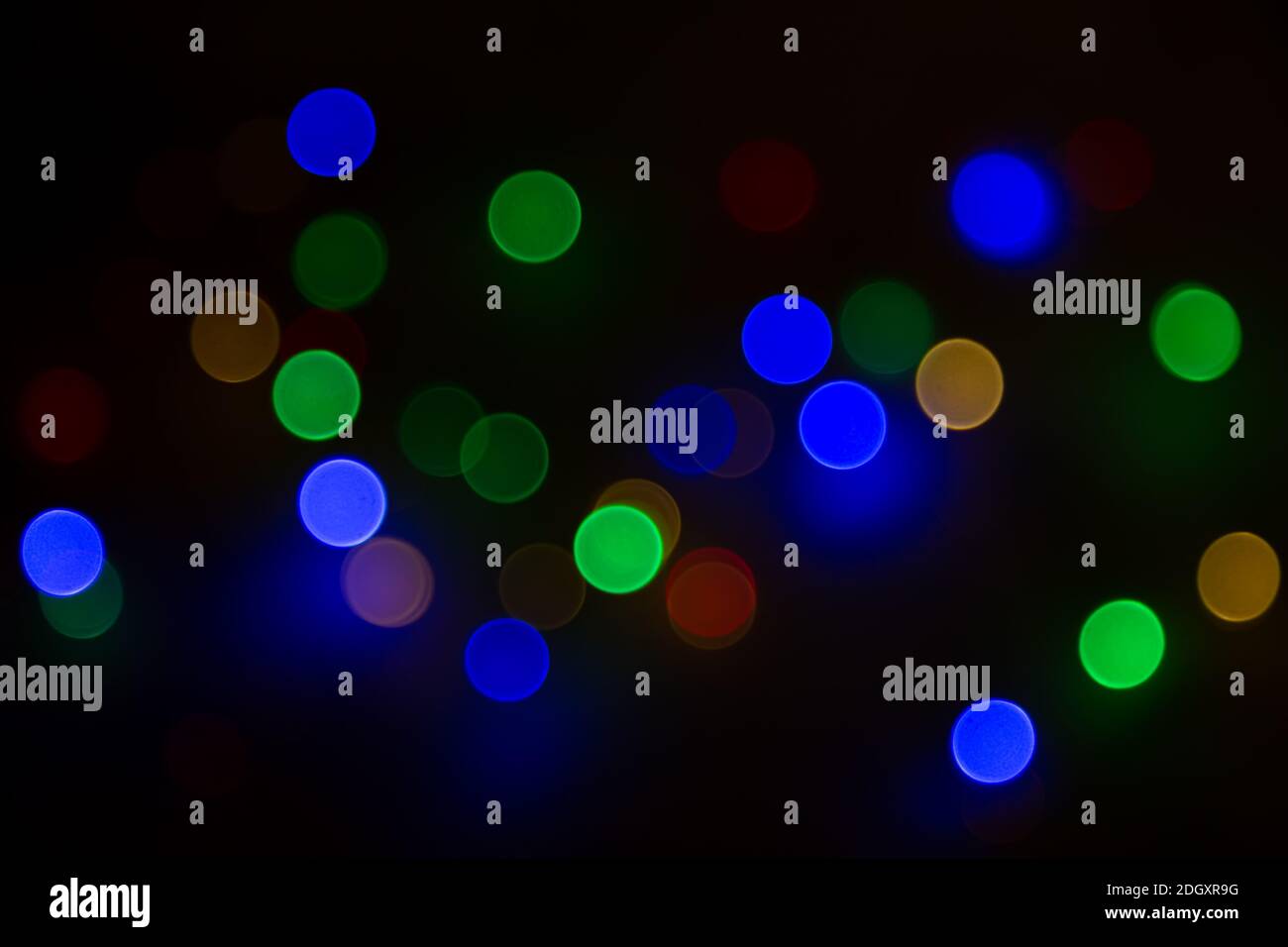 Abstract background, multicolored bokeh on a black background. Stock Photo