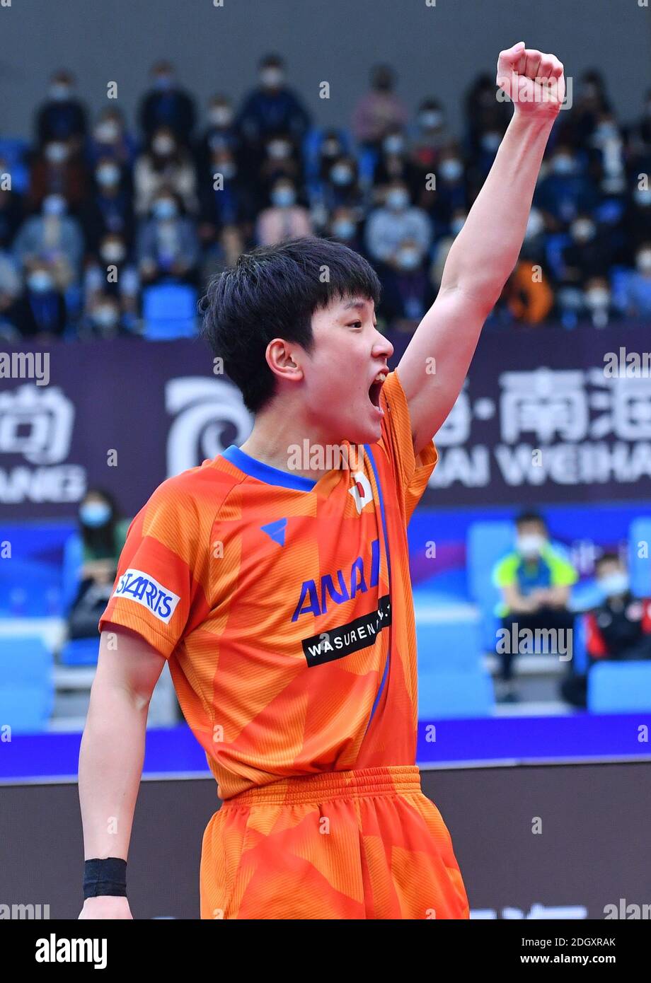 Japanese table tennis player Tomokazu Harimoto plays against South Korean table tennis player