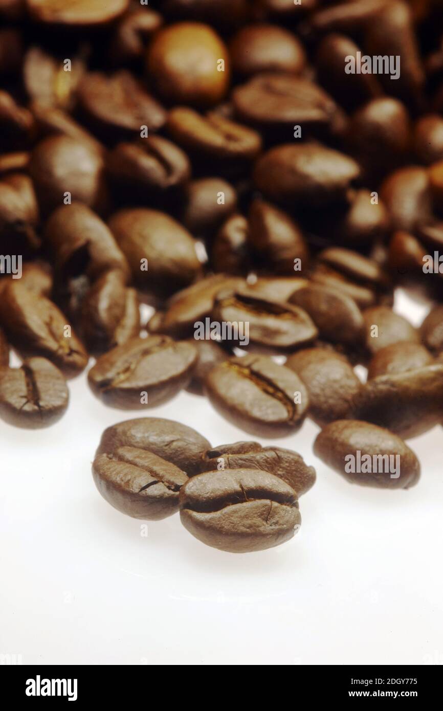 Roasted coffee beans on a table Stock Photo