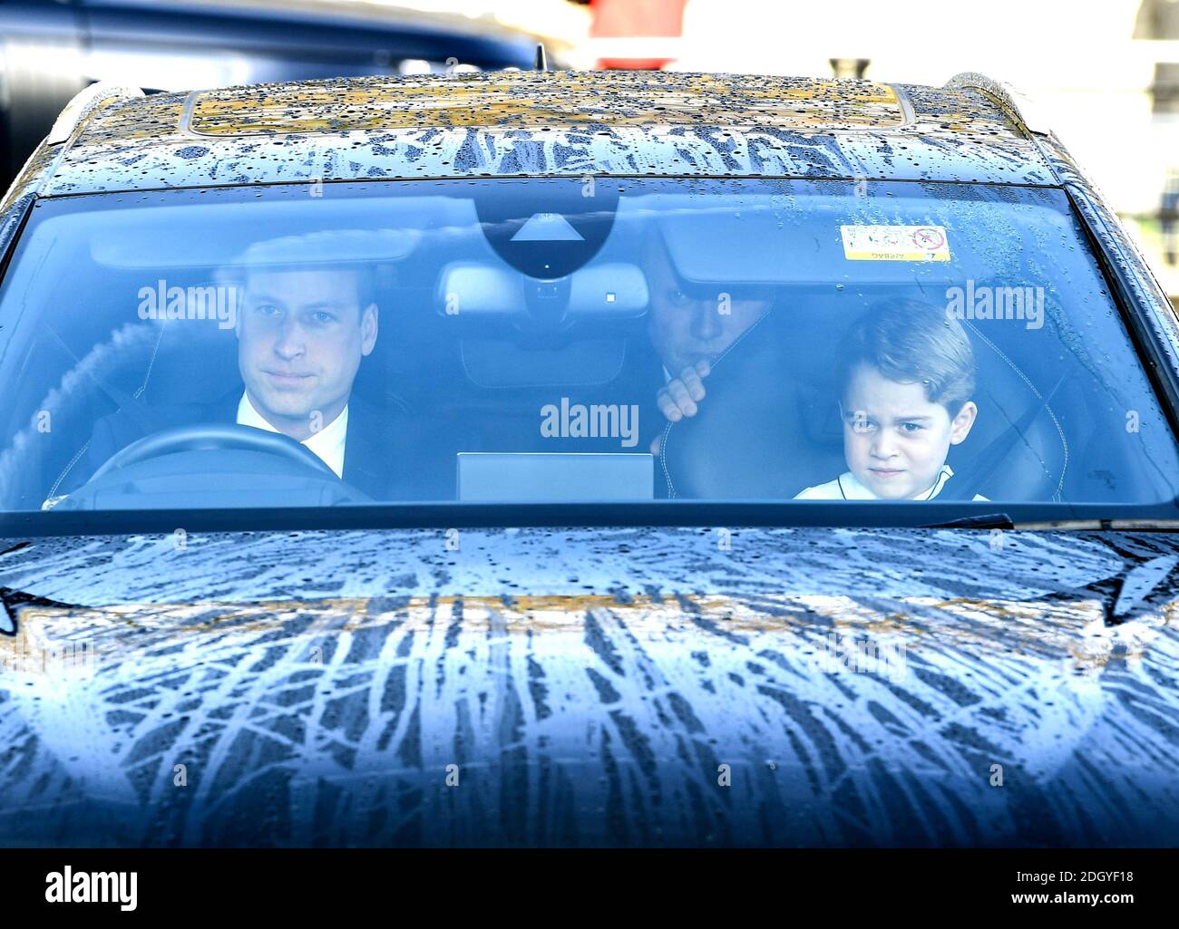The Duke of Cambridge and Prince George arriving at the Queen's