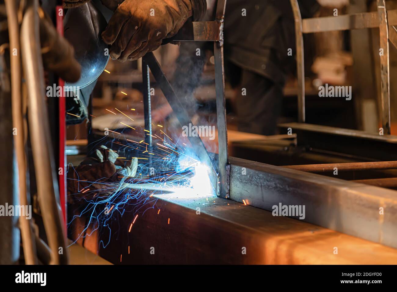 Welding of metal structures using semiautomatic weld Stock Photo Alamy
