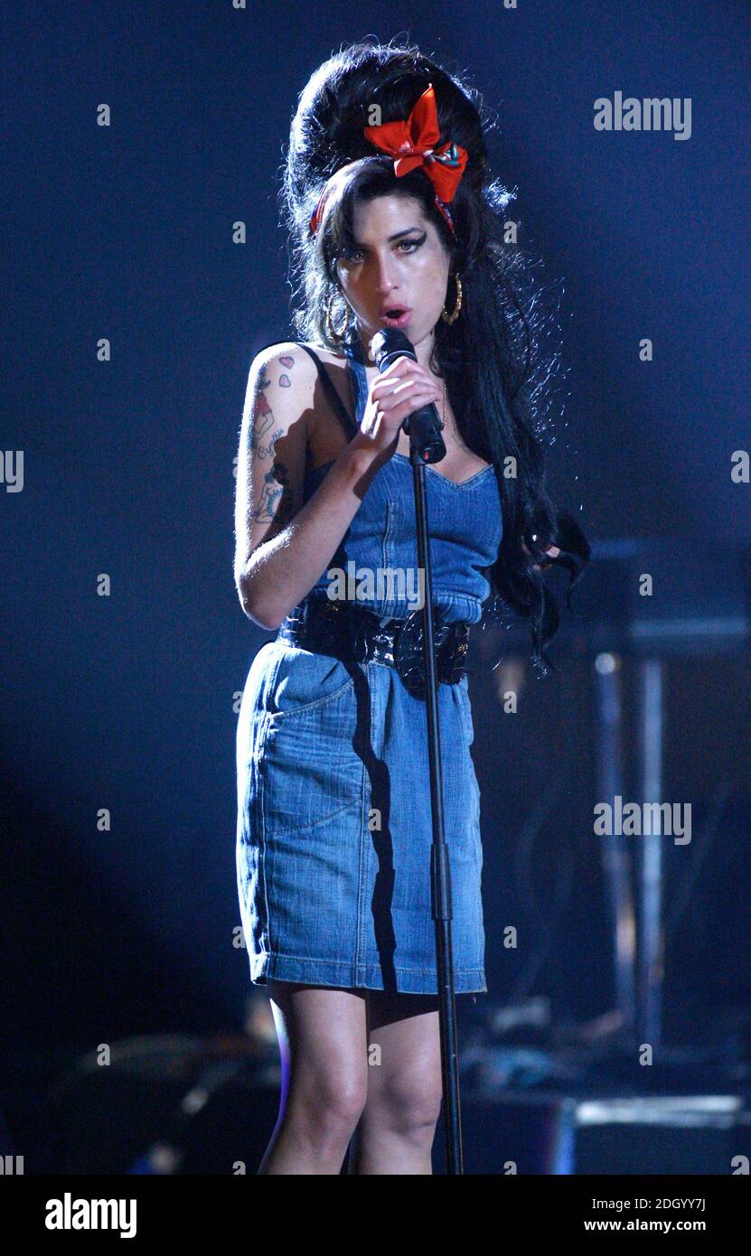 amy winehouse blue dress Amy Winehouse's Most Iconic Outfits