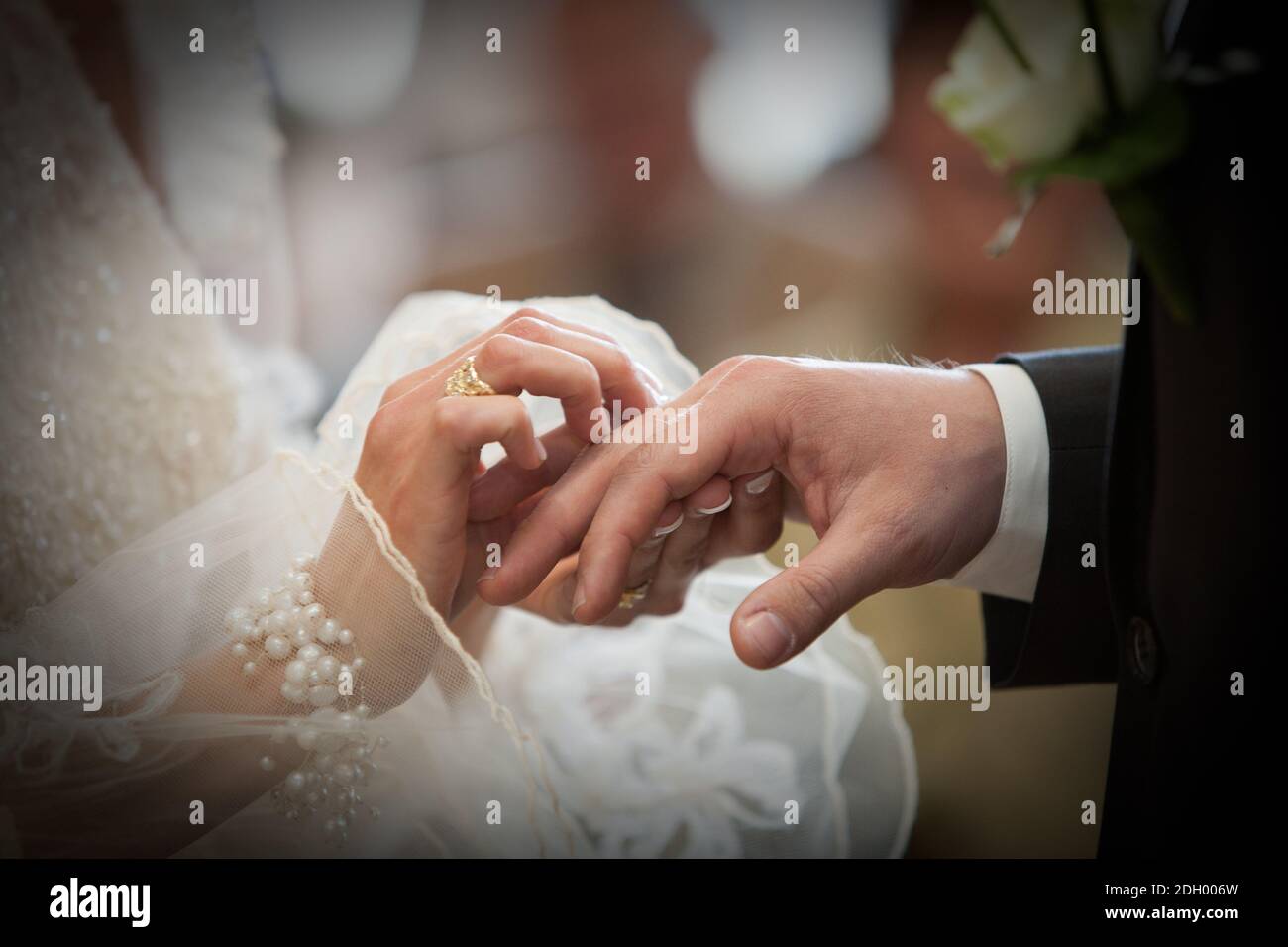 Bride and groom exchanging of the Wedding Rings Stock Photo