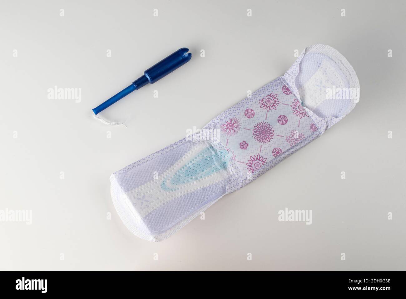 Choice between a tampon and a sanitary towel as a period product Stock Photo