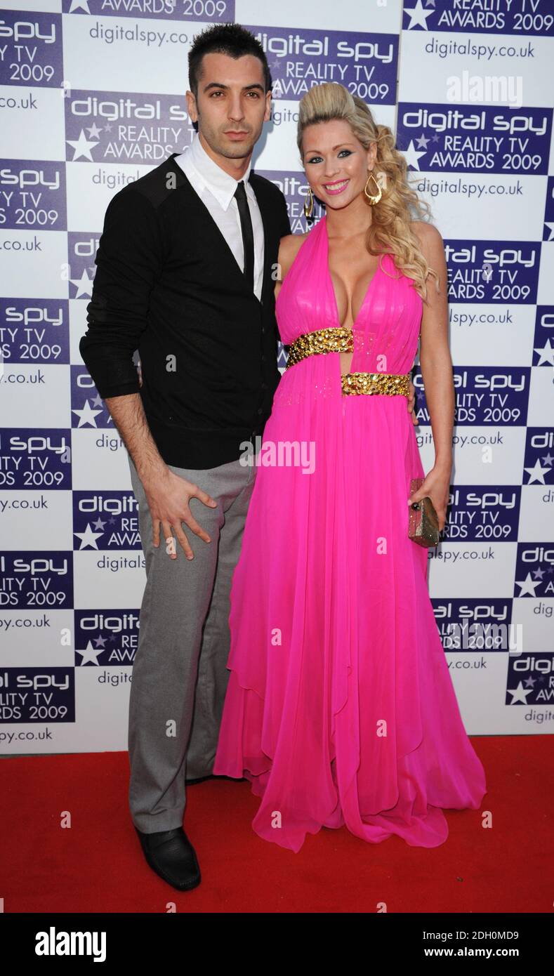 Page 3 model Nicola McLean and boyfriend Peterborough United footballer Tommy Williams arriving at the Digital Spy Reality TV Awards, Bloomsbury Ballroom, Holborn, London Stock Photo