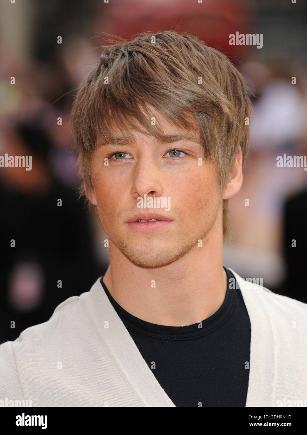 Mitch Hewer arriving at the UK Film Premiere of 'Hannah Montana' at the Odeon West End, London. Stock Photo