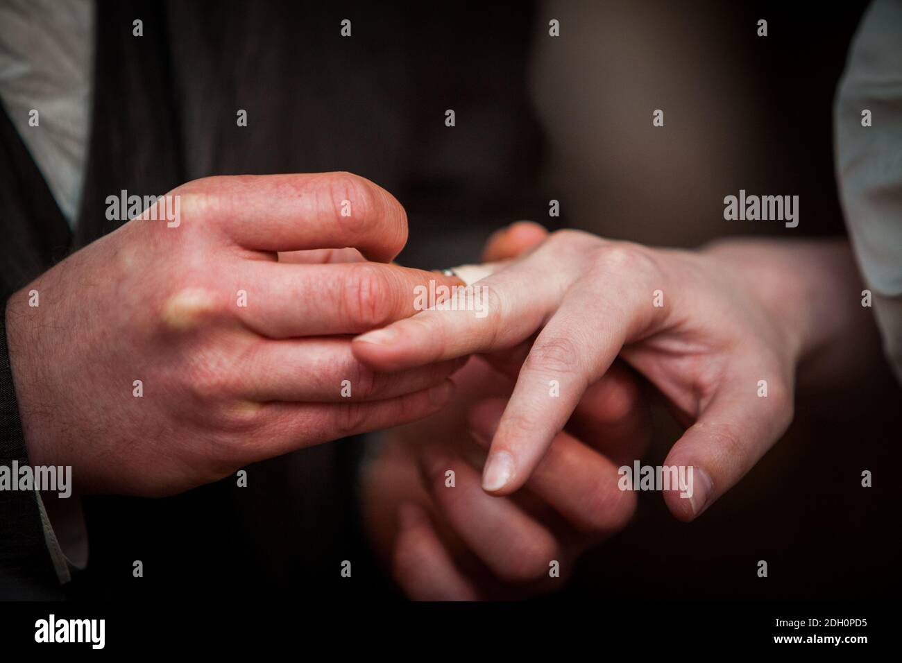 Bride and groom exchanging of the Wedding Rings Stock Photo