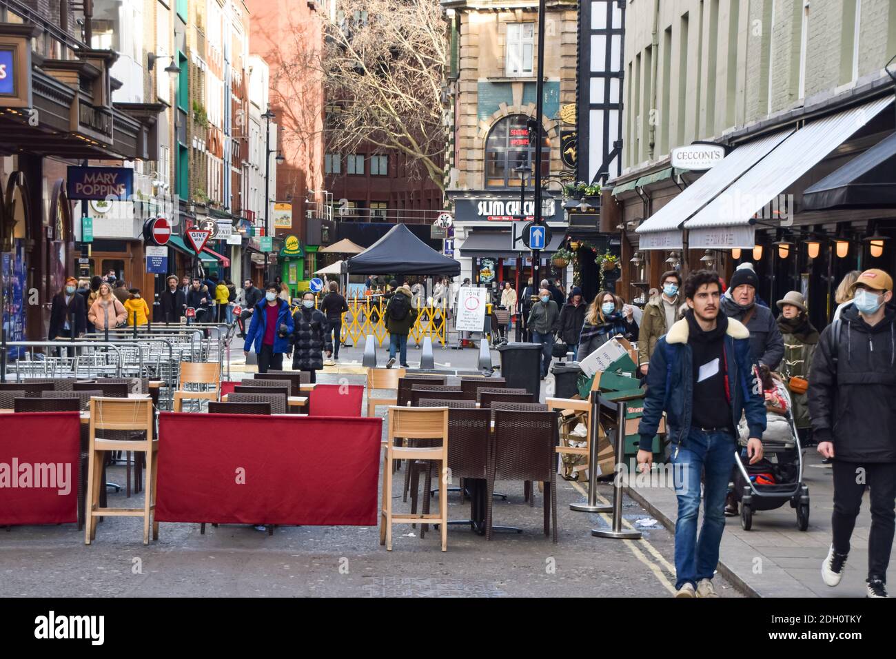 People at bars, cafes and restaurants on Old Compton Street, Soho