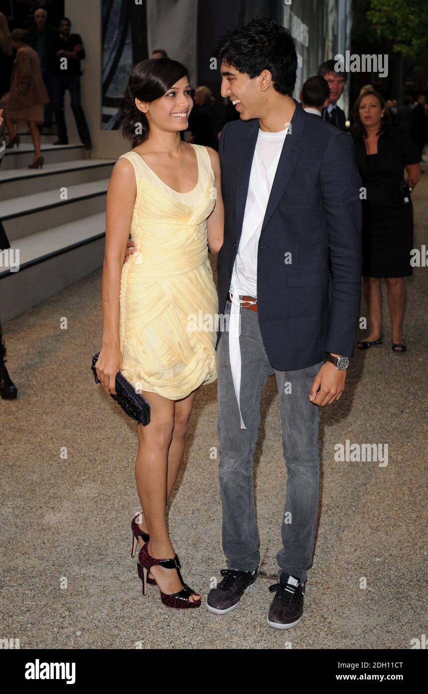 Fredia Pinto and Dev Patel arriving at the Burberry Catwalk Show, part of  London Fashion Week, Chelsea College of Art and Design, Victoria, London  Stock Photo - Alamy
