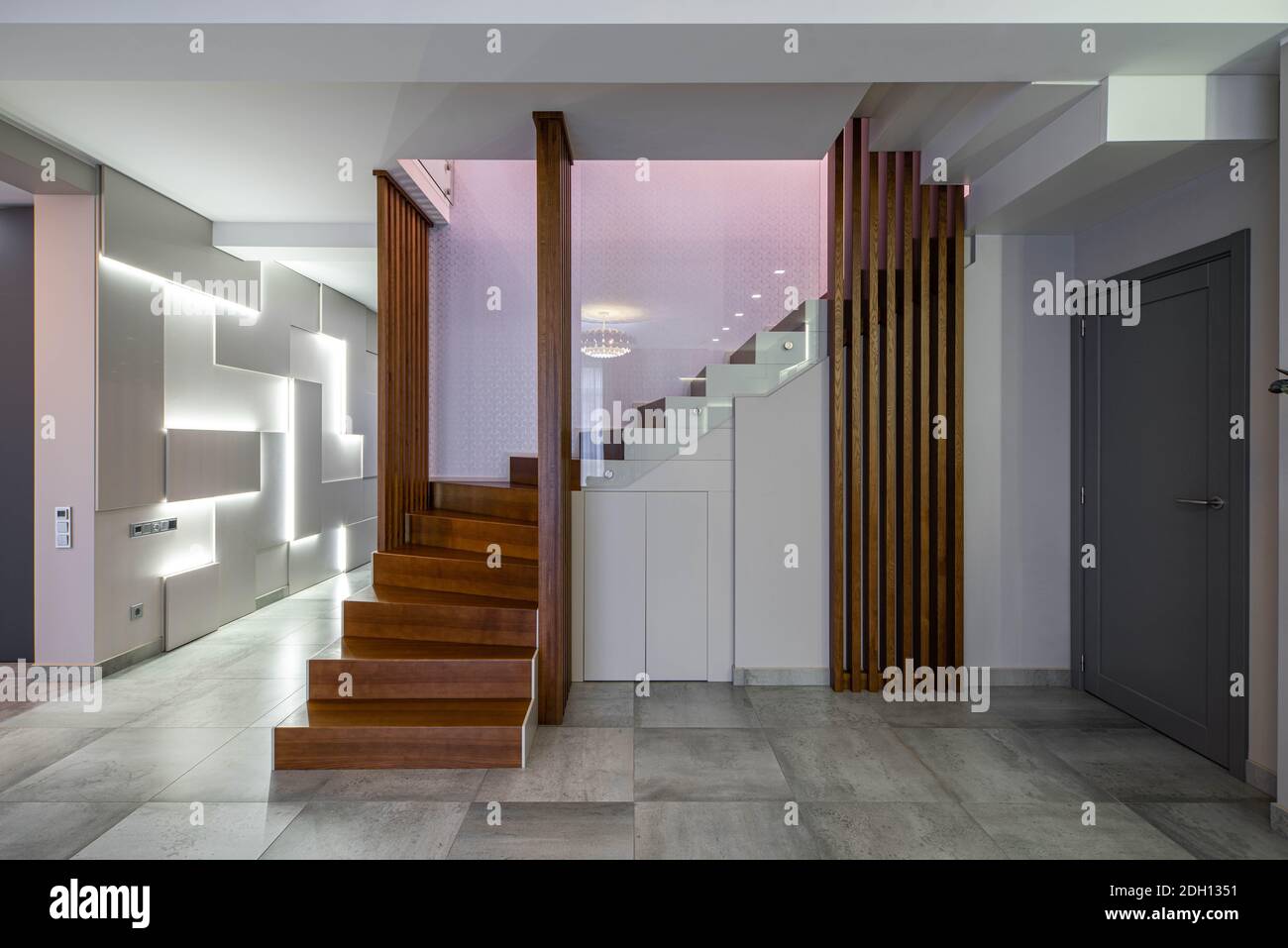 Modern interior of luxury apartment. Wooden staircase. Stylish home ...