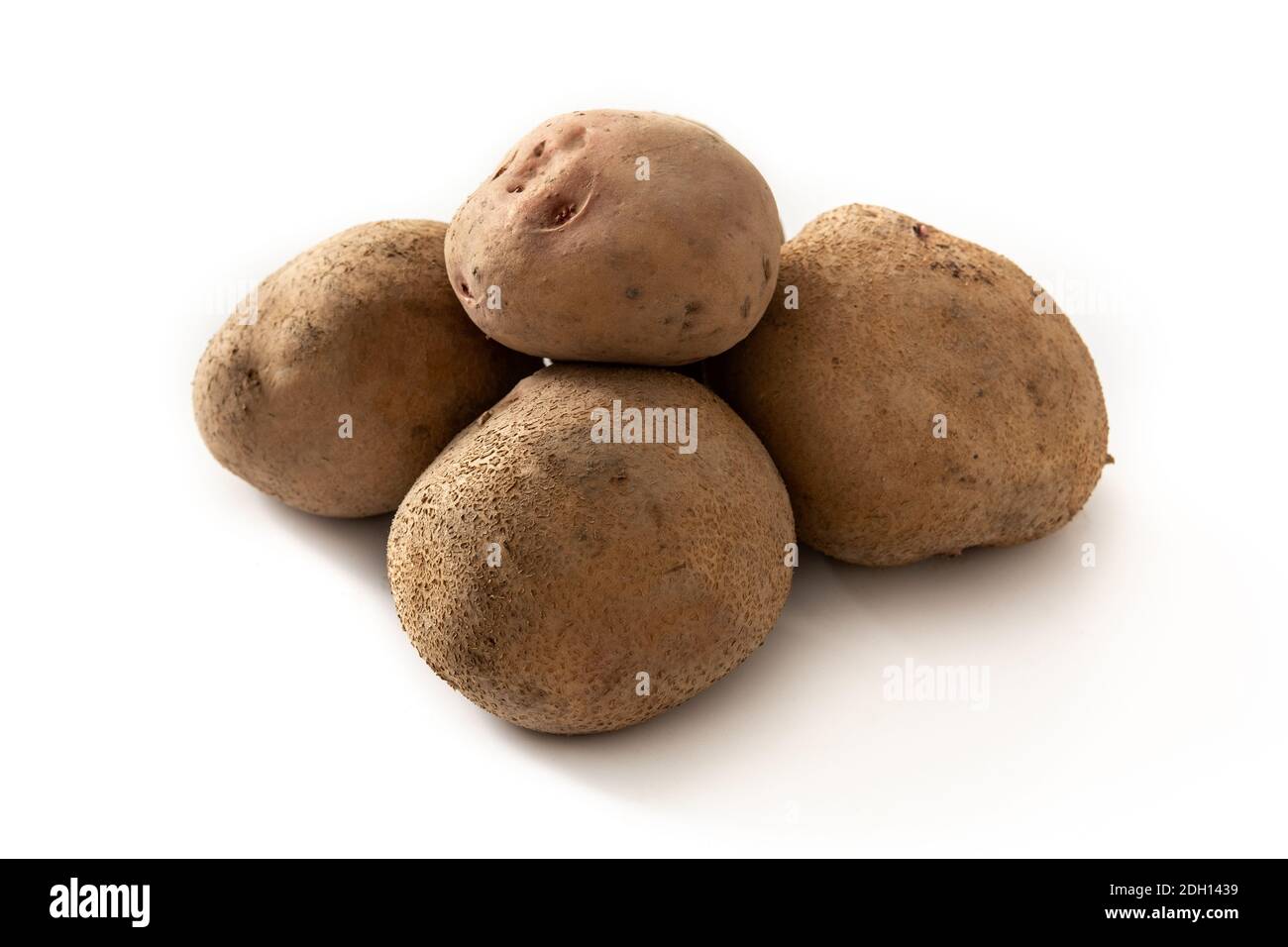 Raw potatoes isolated on white background Stock Photo