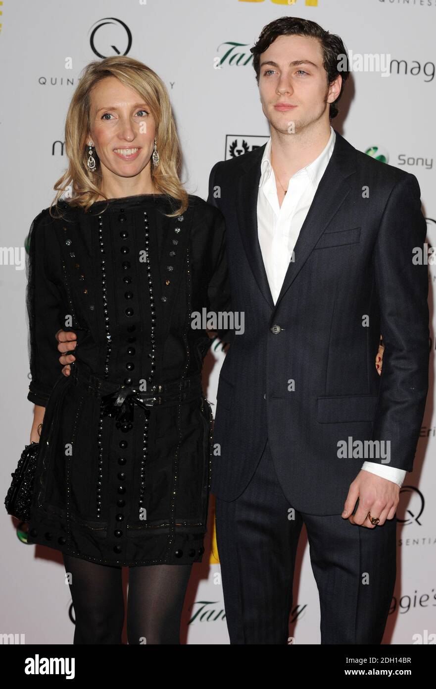 Sam Taylor- Wood and fiance Aaron Taylor-Johnson arrive for the charity premiere of Nowhere Boy, hosted by Quintessentially,, at BAFTA in Piccadilly, London. Stock Photo