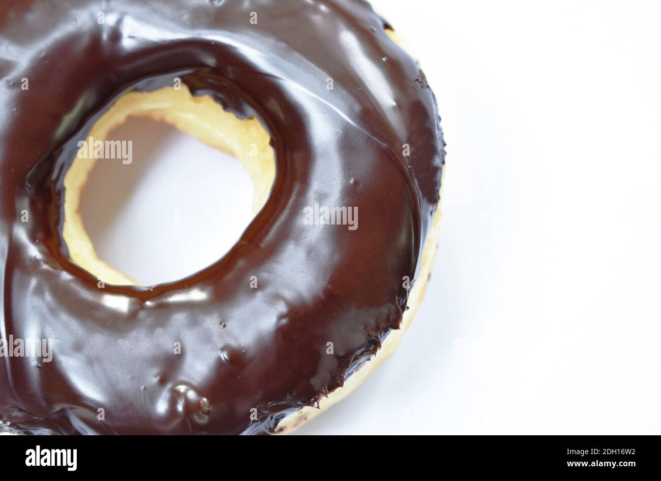 chocolate cream donuts on white background Stock Photo - Alamy