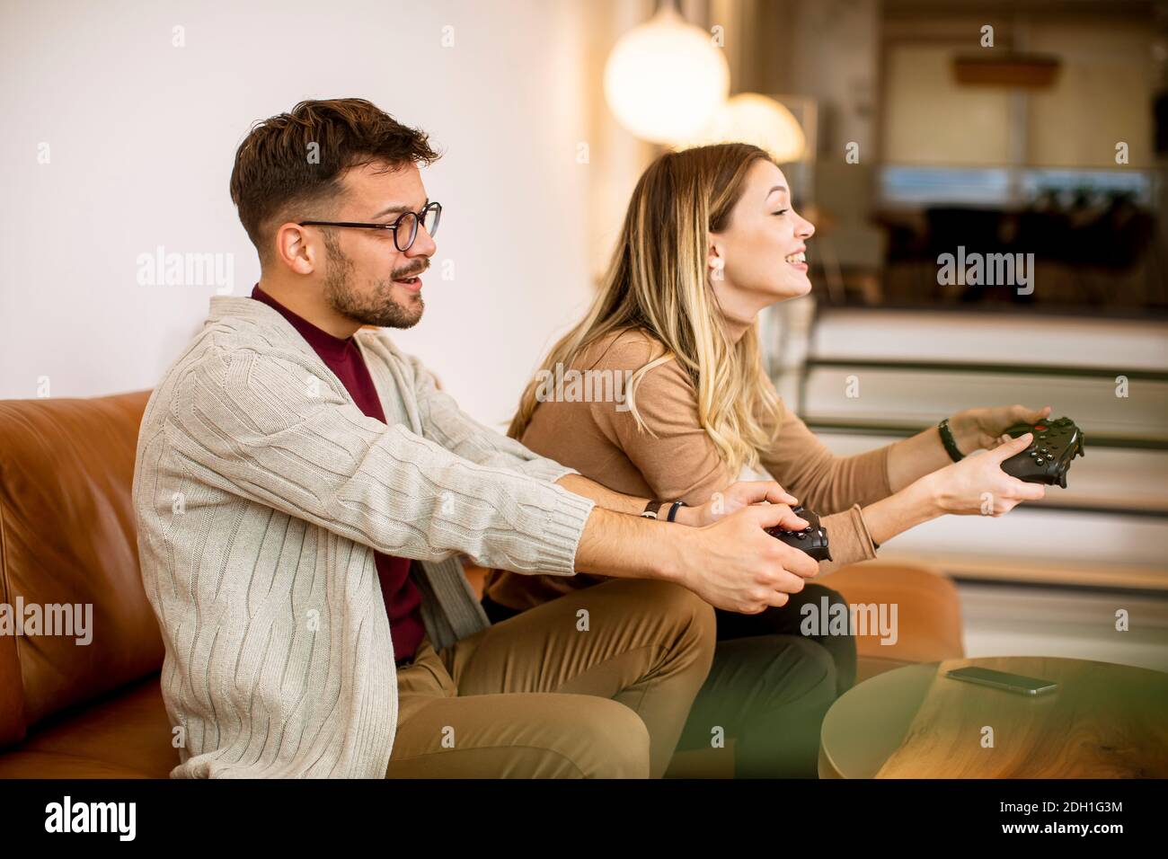 Couple playing games stock image. Image of girlfriend - 132760653